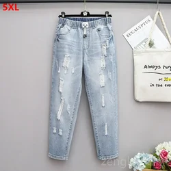 Large size jeans women loose harem pants ninth pants hole 5XL 4XL high waist pants plus size ripped jeans for women