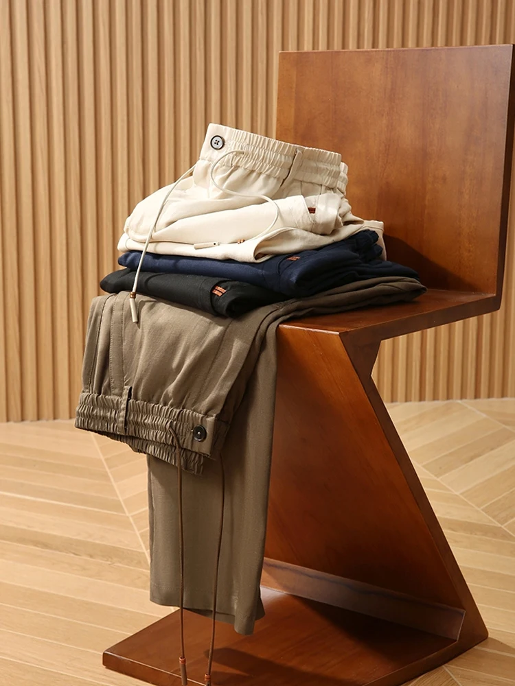 

Импортные итальянские роскошные льняные шелковые мужские летние повседневные брюки с эластичной резинкой на талии, свободный крой, дышащие, удобные, прямые брюки...