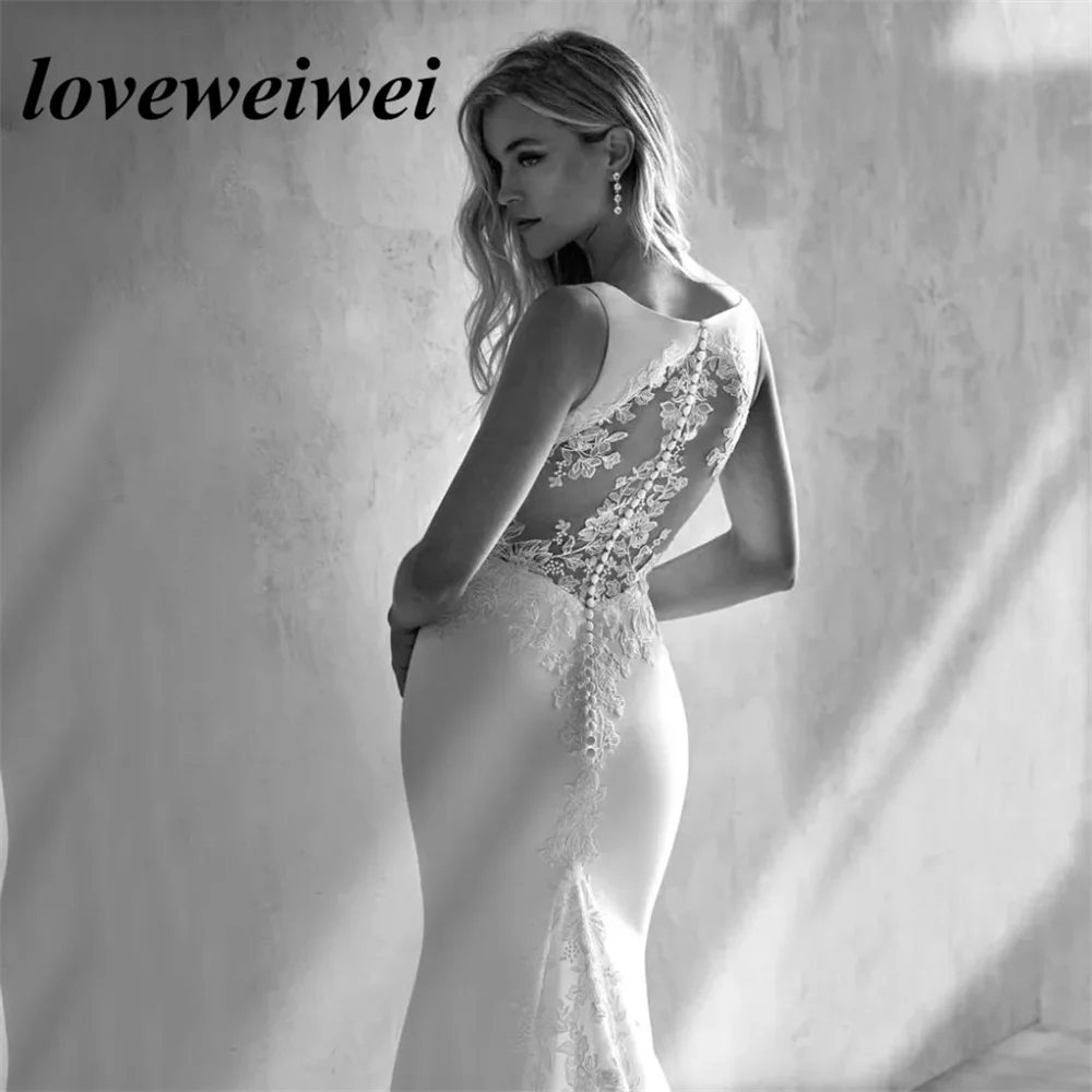 Boho V Neck Mermaid Wedding Dress Sexy Sleeveless Buttons Back Bride Gown Lace Appliques Sweep Train Robe de Mariée