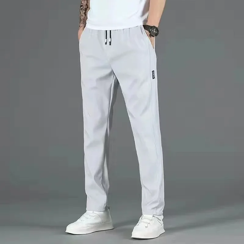 Pantaloni casual estivi da uomo in seta di ghiaccio sottile vestibilità ampia pantaloni sportivi a gamba dritta traspiranti ad asciugatura rapida comodi jeans larghi