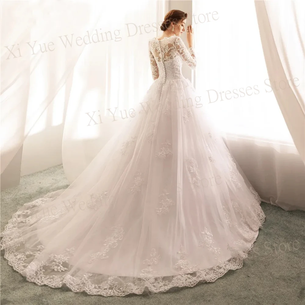 Arabic Dubai Exquisite Tulle Wedding Dresses New Back Buttons Illusion Bride Gowns Court Train Long Sleeve A Line Appliques Lace