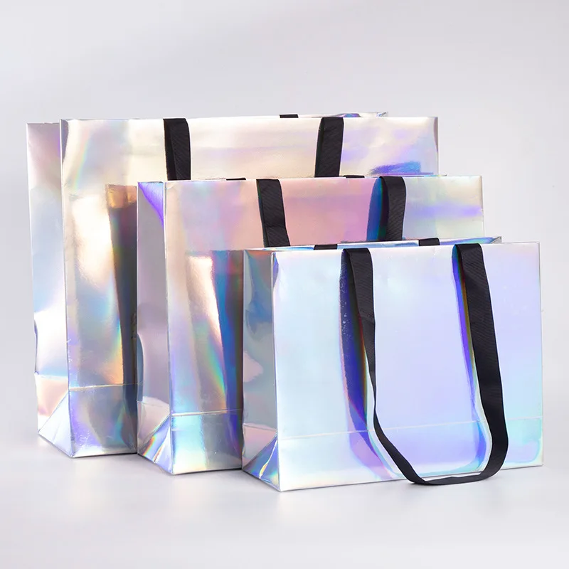 It is customized. Colorful handbag cloth bag customized clothes bag high-end solid customized paper packaging bags