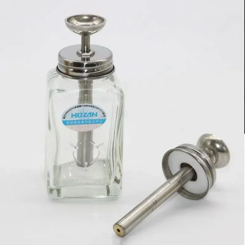 HOZAN 180 مللي نوع الصحافة زجاجة كحول زجاجية صغيرة مسامية دفع من نوع مكافحة رذاذ مكافحة حجب زجاجة تنظيف من الفولاذ المقاوم للصدأ