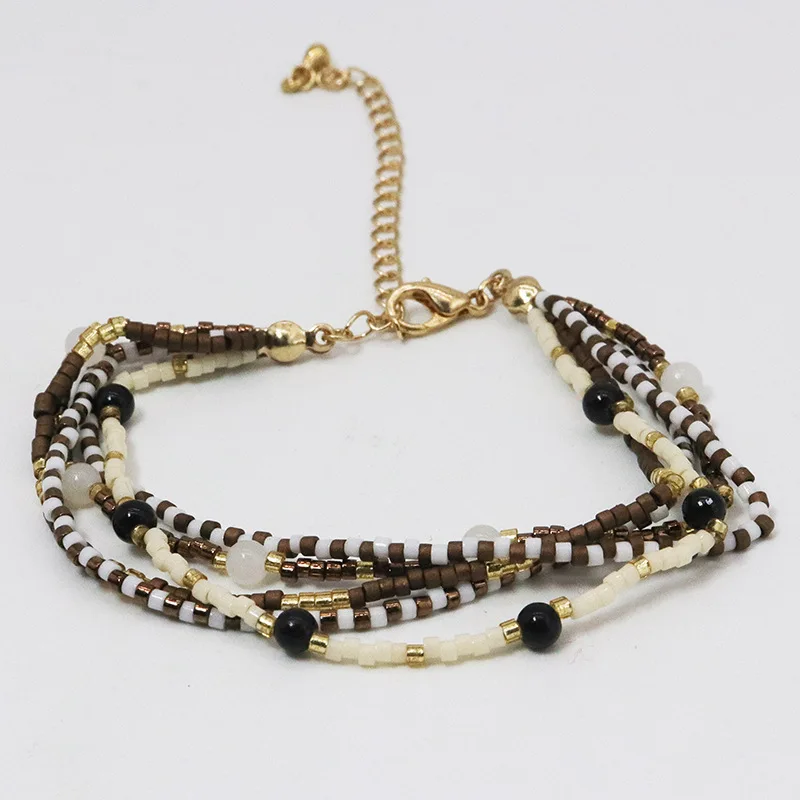 Rice bead bracelet Originality Multilayer Crystal Hand knitting Bohemia Adjustable Fashion Simple Beaded bracelet