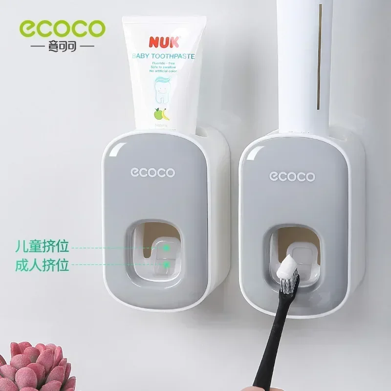 ECOCO Fully automatic toothpaste squeezing suction wall mounted squeezer for household non perforated toothbrush storage rack