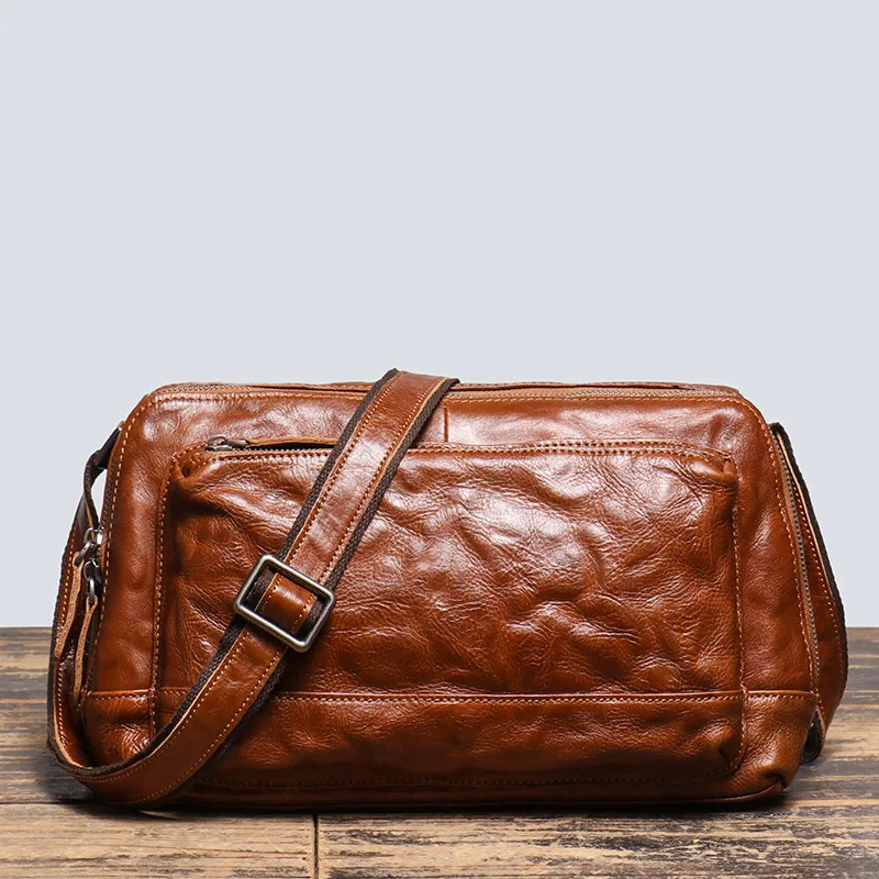 

2026 Retro Personalized Genuine Leather Men's Bag Single-shoulder Cowhide Messenger Hand-grabbed Pattern Large Designer Luxury