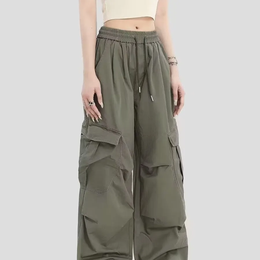 กางเกงขายาวสตรีทฮิปฮอปสไตล์ฮิปฮอปกางเกงผู้หญิงคาร์โก้ที่ได้รับความนิยมสุดเท่ห์อินเทรนด์สไตล์ยุโรปอเมริกันกางเกงขายาวทรงหลวมกางเกงเข้าชุด