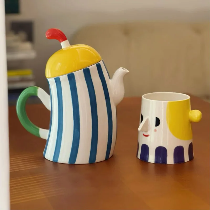 Cute Ceramic Teapot With Tea Infuser Hole ,Akimbo Handle Beautiful Tea Pot Water Kettle Porcelain Jug With Lid 1L