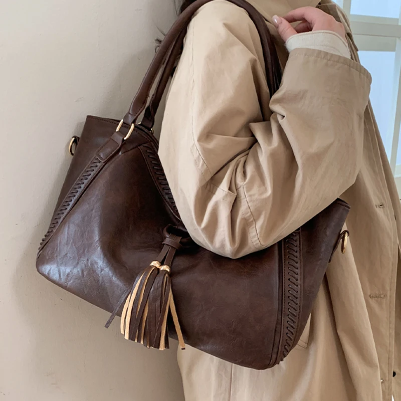 أنيقة المرأة شرابة حقائب كتف واحدة الكورية الرجعية VersatilePU حقائب عادية سعة كبيرة حقيبة تسوق سفر 2026 الاتجاه الجديد