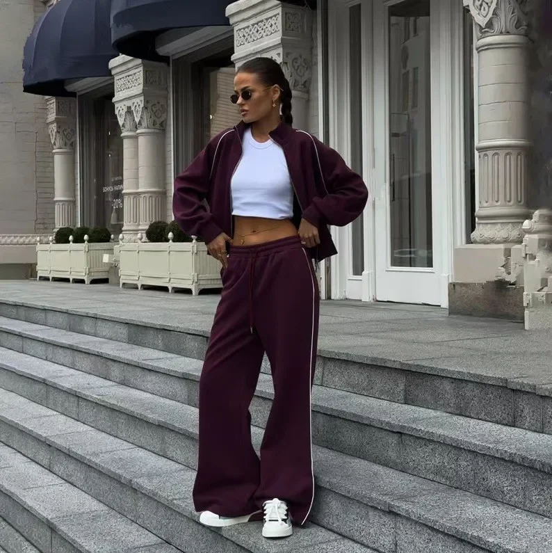 European and American new double-ended zipper contrasting sports suit Spice Girl street fashion side split straight pants suit