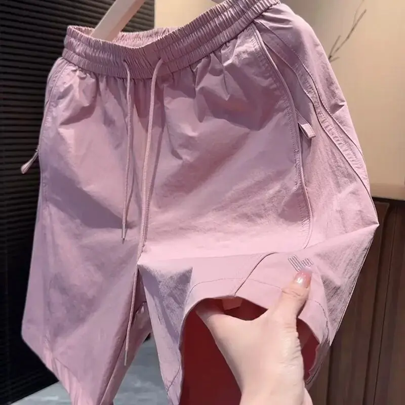 

Men's Summer Lightweight Breathable Loose Fit Sporty Beach Shorts Quick Dry Four-Pocket Zipper Shorts Casual Polyester Fiber