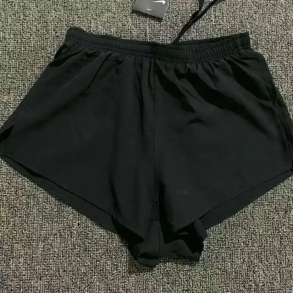 Pantalones cortos profesionales para correr maratón, pantalones de entrenamiento deportivos atléticos de secado rápido para hombre, doble capa, tres cuartos de longitud