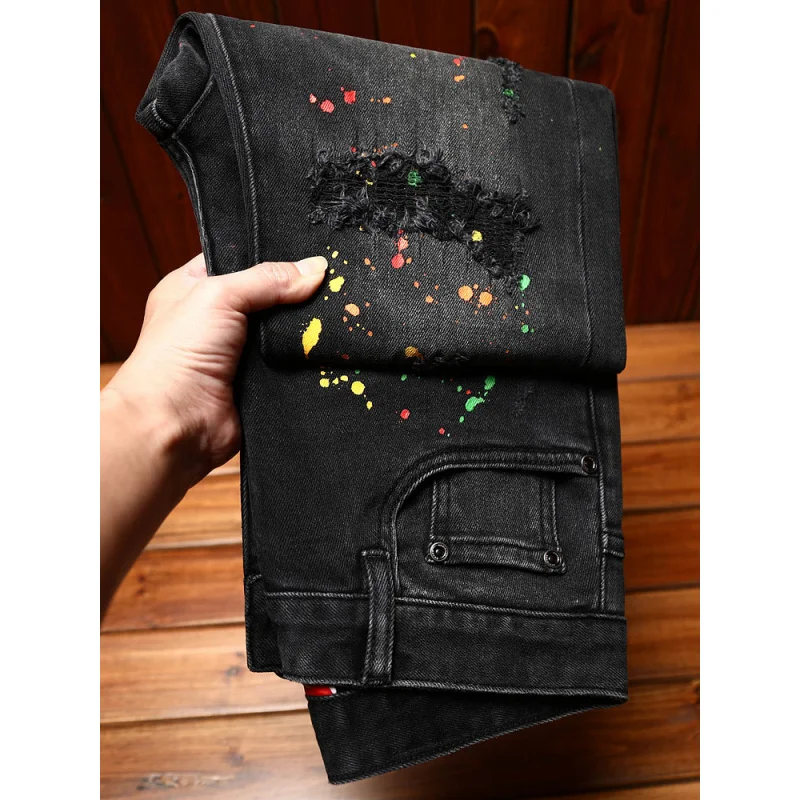 High end trendy black jeans for men, slim fit, elastic, perforated patch, paint printed, trendy street style small leg pants