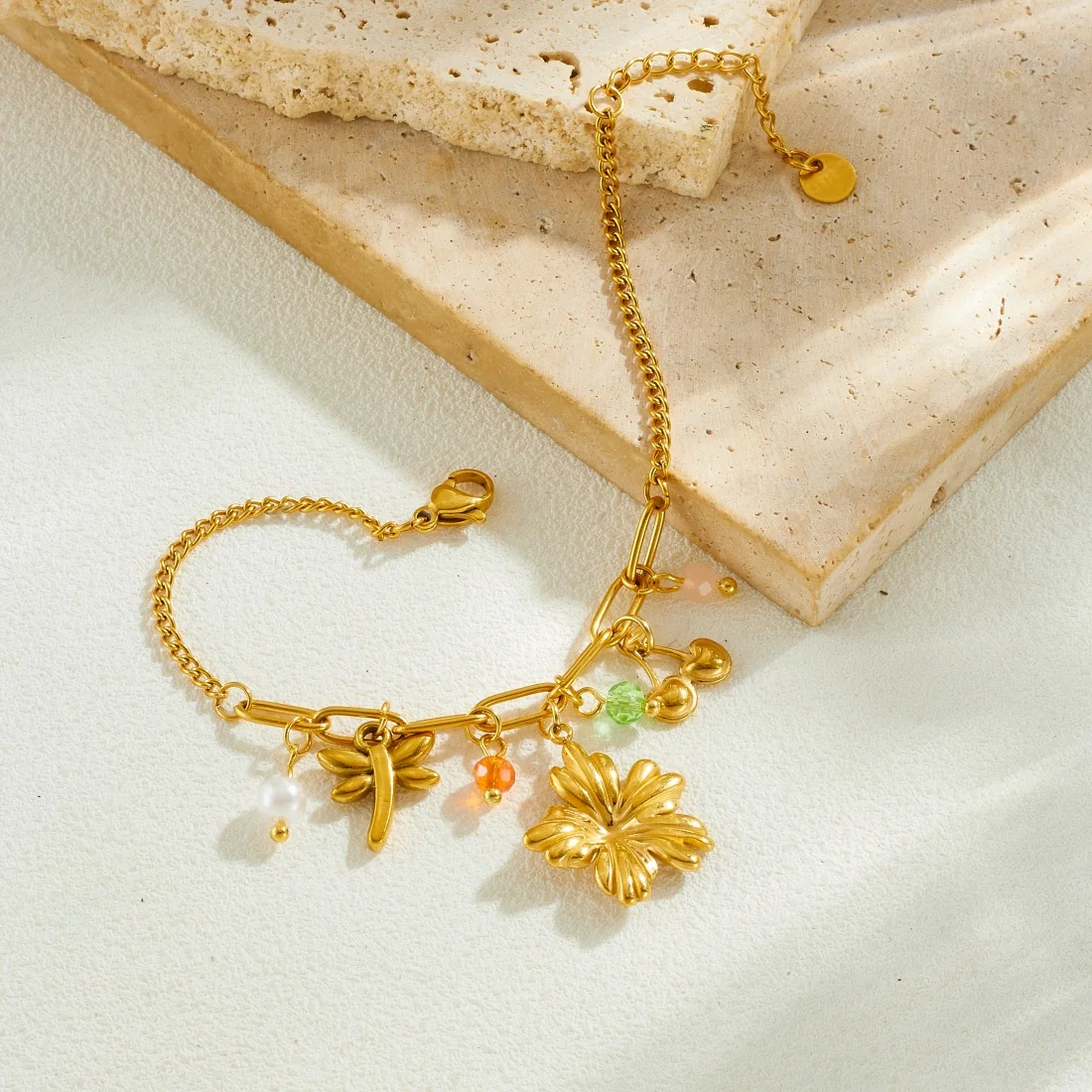 Roestvrij staal gouden bloem D - String Of Pearls Plant recensie en prijs
