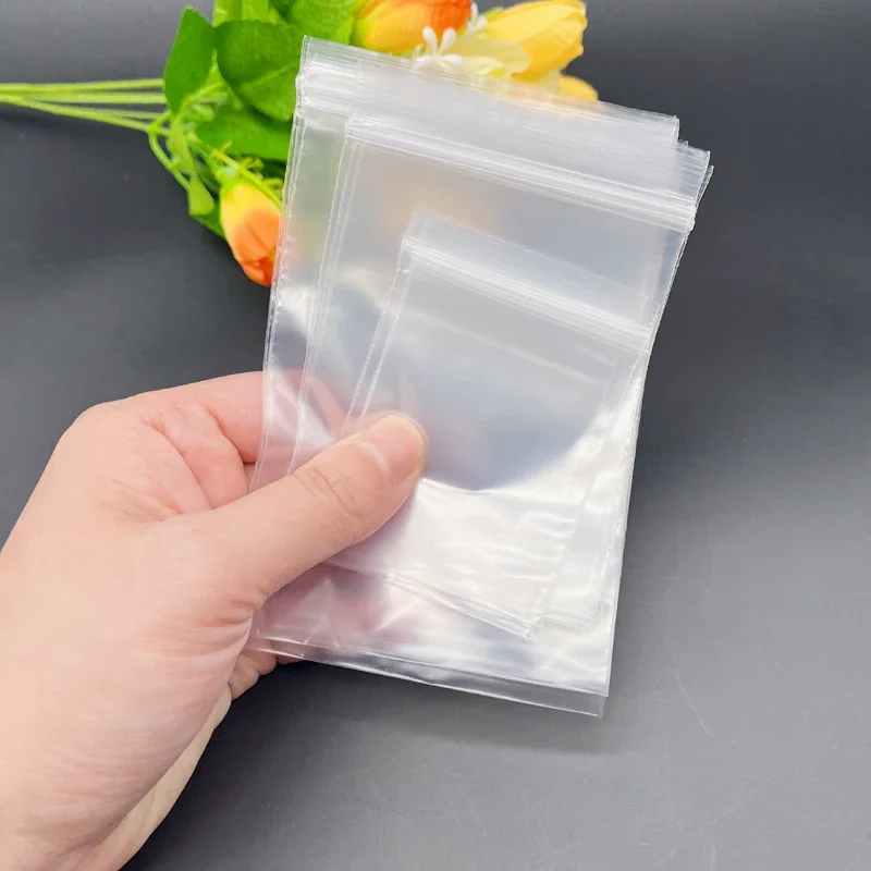 1000 ชิ้นถุงพลาสติกใสถุง Ziplock นํากลับมาใช้ใหม่ถุงของขวัญสีขาวสําหรับเครื่องประดับงานแต่งงานถุงบรรจุภัณฑ์ Reclosable Mini กระเป๋าเก็บ