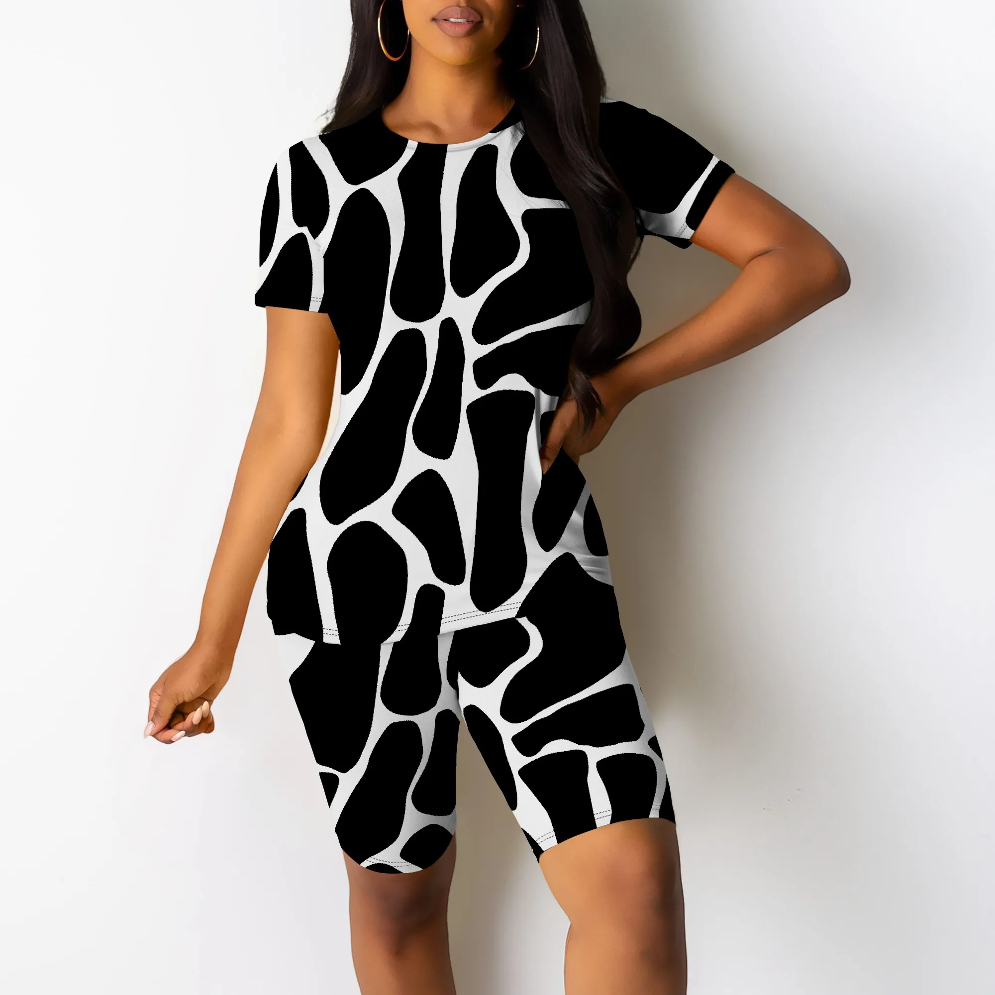 

Nupusa Women Cow Print 2 Piece Set Short Sleeve T Shirt and Bodycon Biker Shorts Summer Matching Outfit Casual Streetwear
