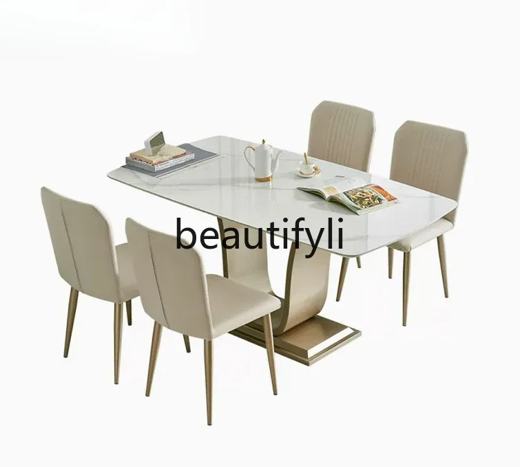 

Rock slab dining table light luxury modern simple home dining table and chairs