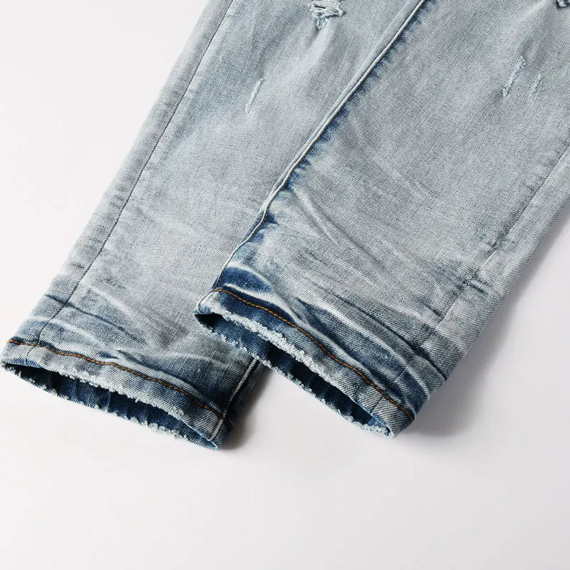 Y2k high street designer's new men's jeans, washed with nostalgia, perforated with patchwork patches, light blue jeans, hip-hop