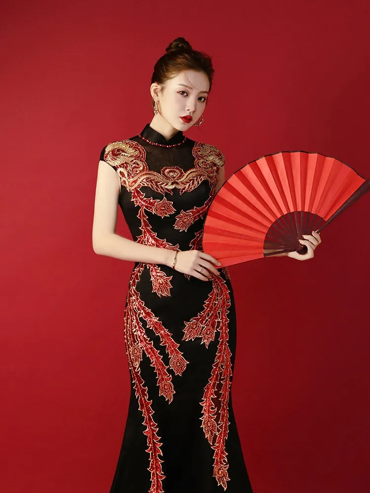 

heavy-duty embroidered catwalk performance showcased host's fitted fishtail dress