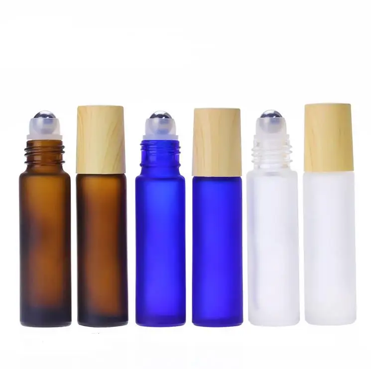 

10ml Amber Blue Clear Frosted Glass Roll On Bottle Essential Oil Travel Perfume Bottle Steel Roller Ball Wood Grain Cap SN1842