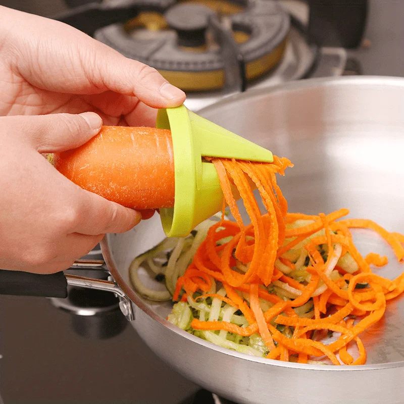 Effortlessly Shred, Peel, and Grate Fruits and Vegetables with this Multifunctional Kitchen Tool!