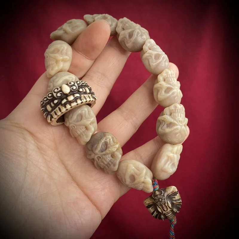 

Tibetan-style hand-carved camel bone skull bracelet with ethnic style