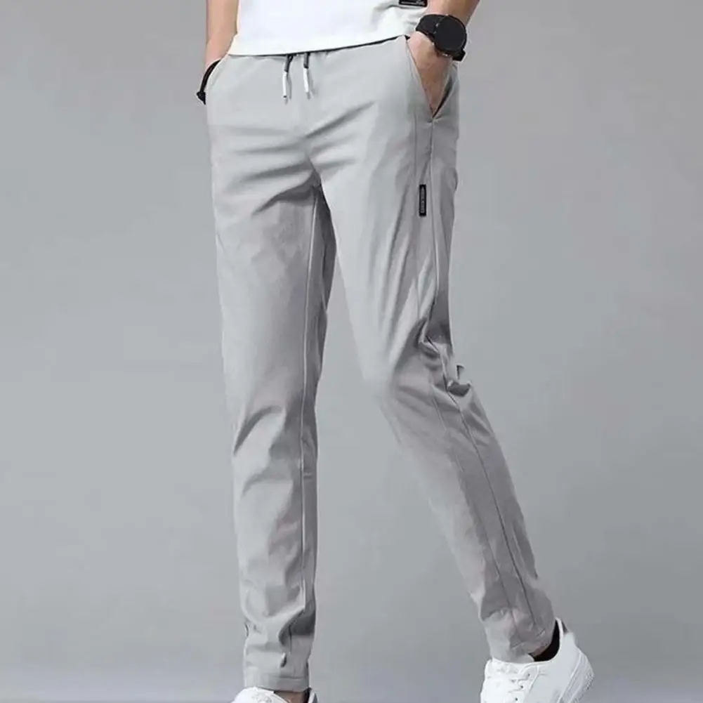 

Men Pants Polyester Drawstring Men Spring Straight-leg Pants Side Pockets Solid Color Men Spring Pants for Daily Wear