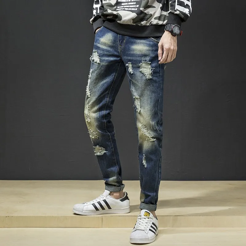 Jeans in Denim da uomo strappati di personalità nuovi pantaloni di marca Hip-Hop con foro rotto europeo e americano di grandi dimensioni maschili