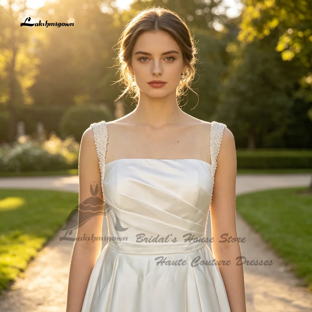 Lakshmigown Bescheidenes Satin-Hochzeitskleid für die Braut 2027 Quadratischer Ausschnitt A-Linie Weiße Brautkleider mit Perlen und Spaghettiträgern Maßanfertigung – Detail 6