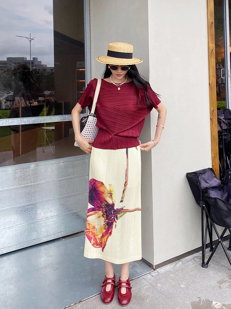 Damska spódnica midi na lato 2025, z wysokim stanem, luźna, elastyczna, w stylu vintage, z modnym nadrukiem, idealna na podróże i do noszenia na co dzień.