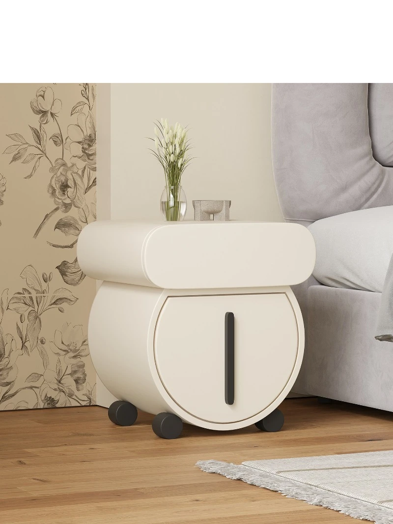 Cream style designer special-shaped art bedside table medieval high-end Internet celebrity paint bedside table