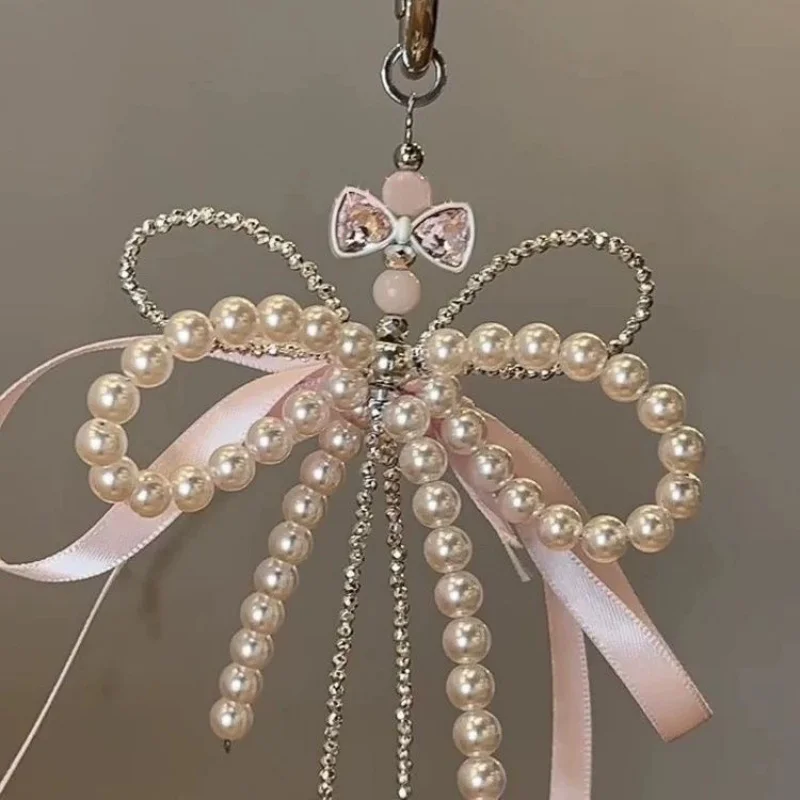 2025 جديد الكورية موضة الحلو اللؤلؤ القوس المفاتيح قلادة هاتف كيرينغ Y2K Ins حامل الجمالية لفتاة حقيبة قلادة اكسسوارات