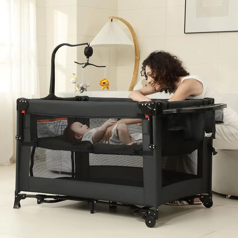All-in-One Portable Playard, Bedside Bassinet Sleeper, Changing Table Playpen for Newborns to Toddlers (Black)