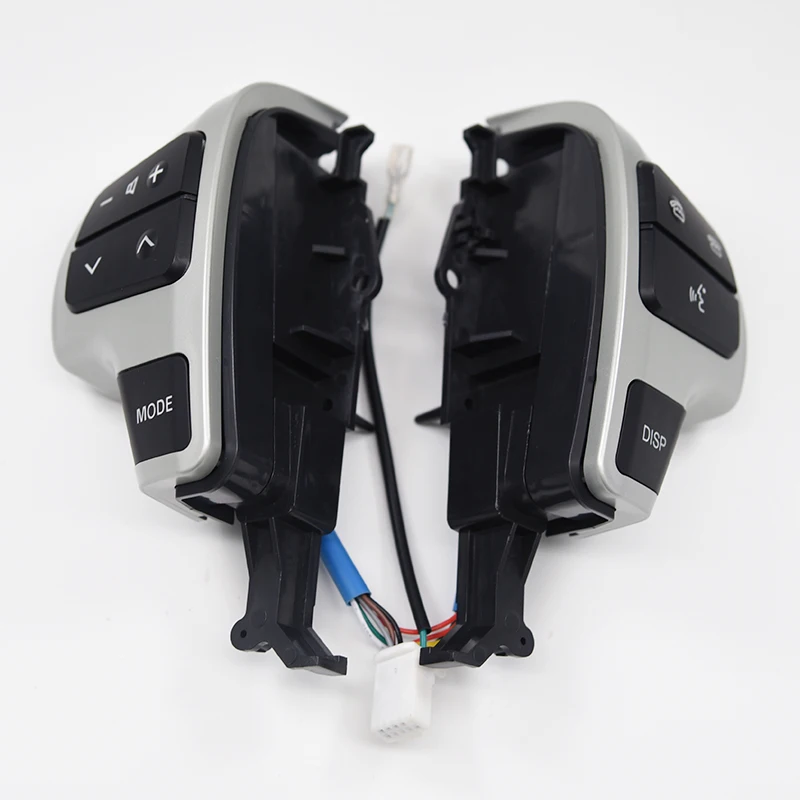 

A Pair for 05-11 year Toyota Praland Cruiser multifunctional steering wheel buttons
