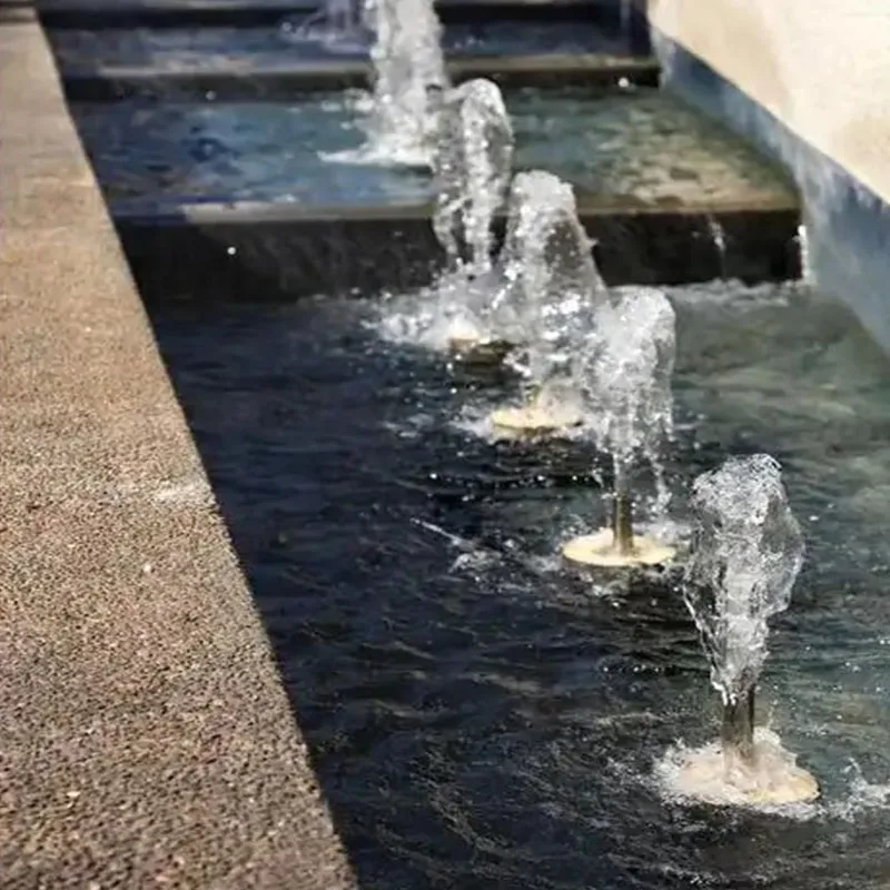 A Decorative Small Fountain That Creates an Elegant and Serene Atmosphere in the Garden