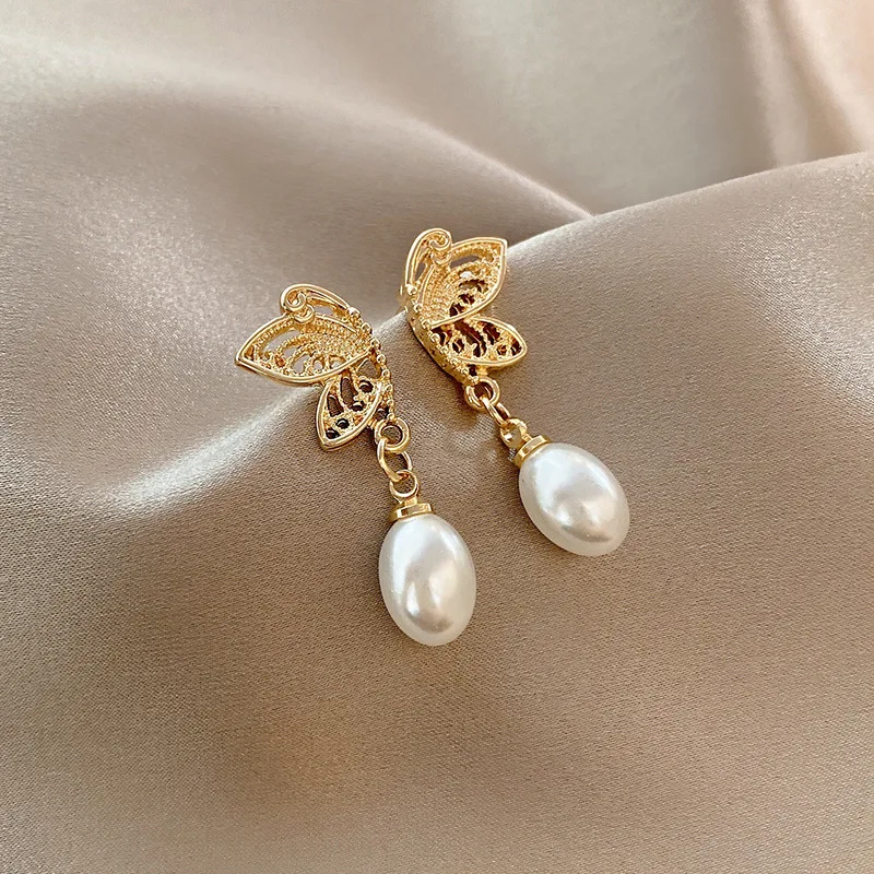 

INS Wind Retro Fashion Women's Earrings Long Butterfly Pearl Earrings Cold Light Wind Net red Butterfly Earrings Female Gift