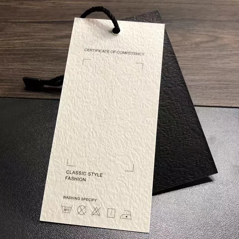 Custom..pieces.Factory discount custom environmental label embossed hanging neck garment paper hang