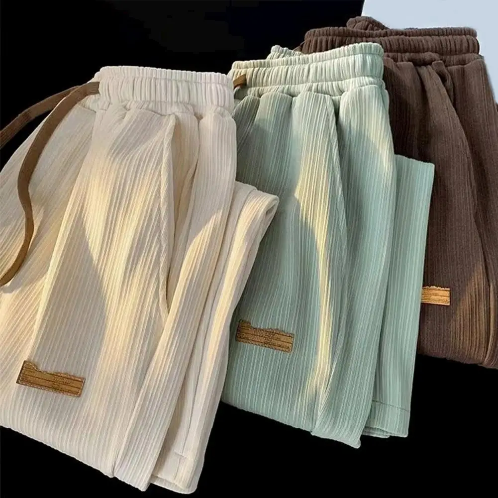 Pantalones de seda de hielo para hombre, pantalones informales ultrafinos acanalados con bolsillos y cordón, pantalones largos deportivos informales con cintura elástica