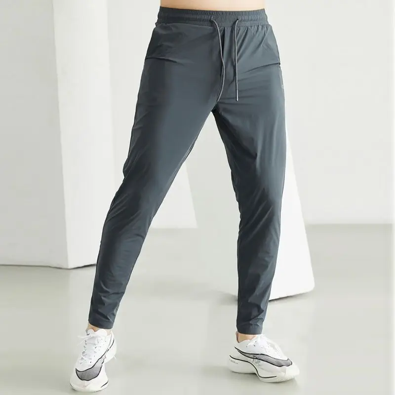 Trainings anzug Männer schlanke Sport hose Jogging hose Frühling Sommer elastische Taille Outdoor lässig schnell trocknen Training solide Jogger Hose