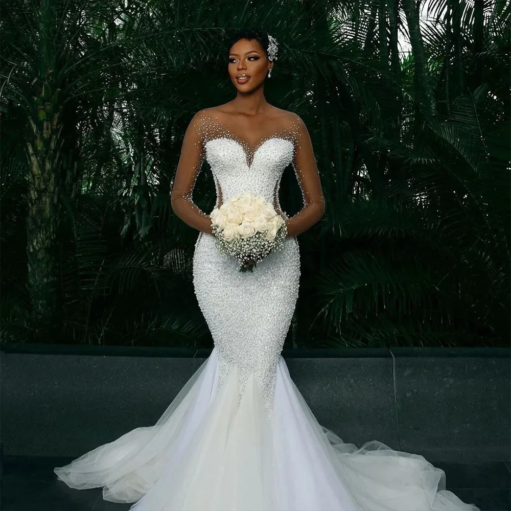 

Lavish Mermaid Wedding Dresses for Bride Sheer Neck Long Sleeve Major Beading See Through Tulle Africa Bridal Gowns Customized