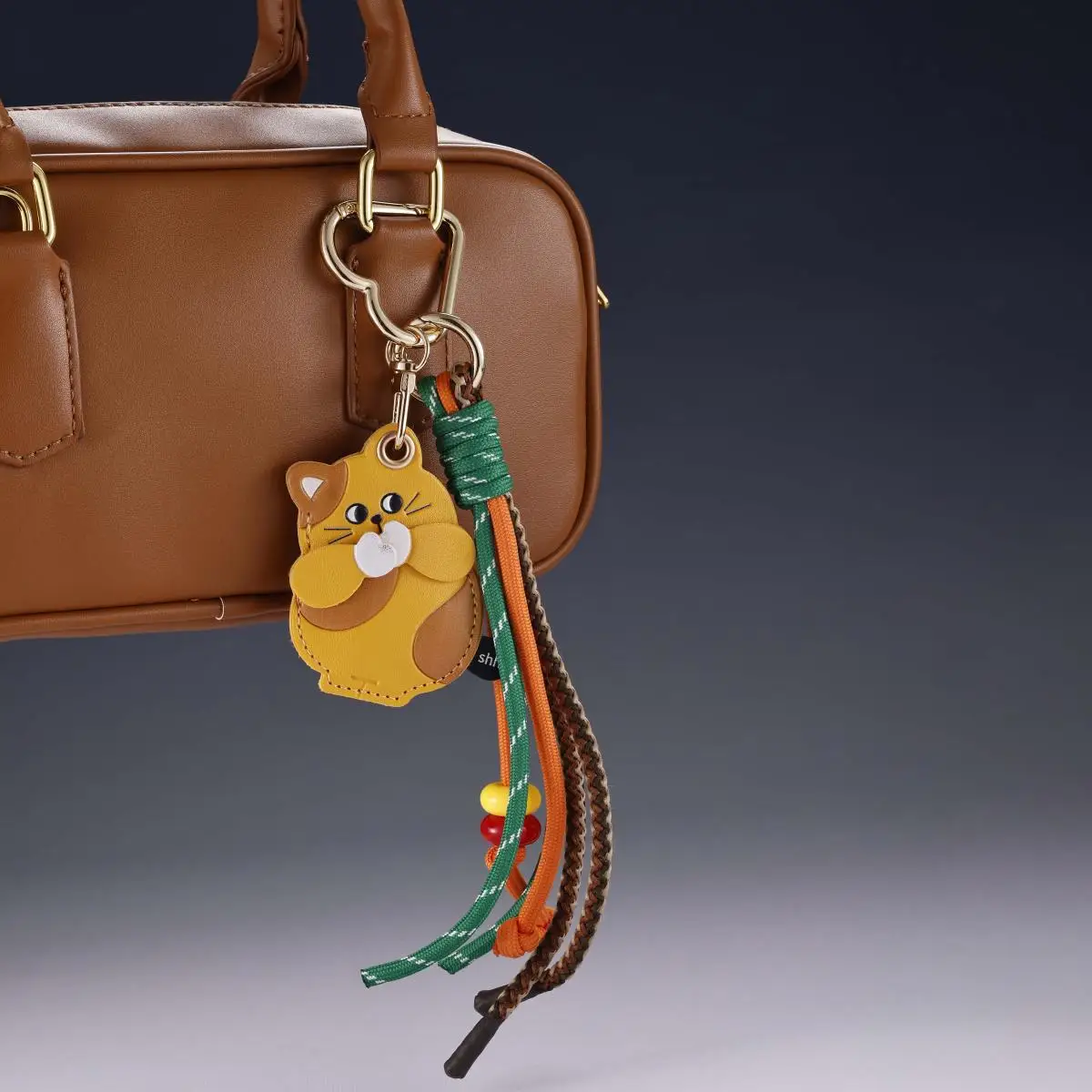 

Fashionable, versatile and cute cartoon tiger woven leather rope key chain
