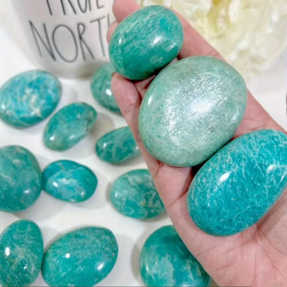 A beautiful natural amazonite – a bluish-green stone with veins, smooth spherical beads