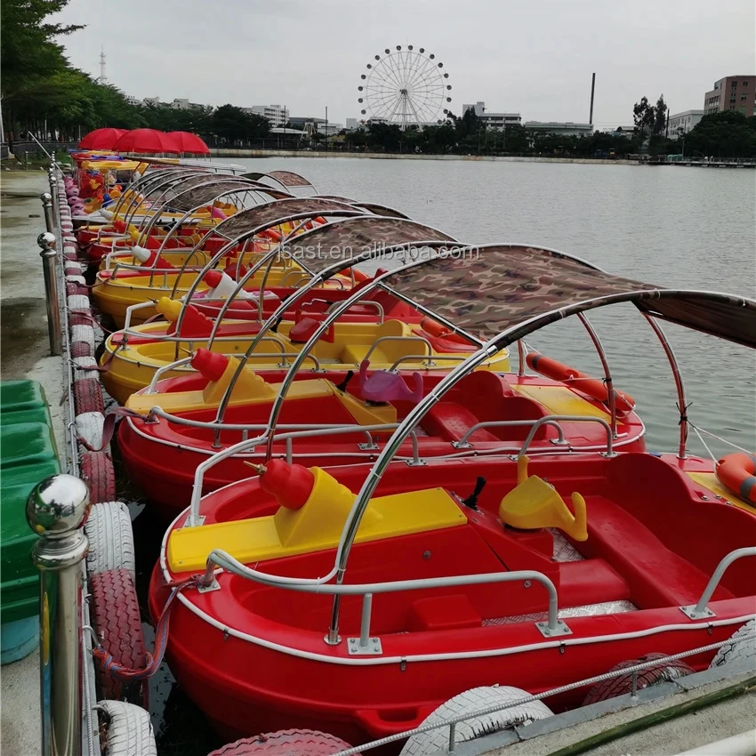 Amusement battery operated electric Plastic luminous bumper boat for swimming pool inflatable plastic boat water gun children