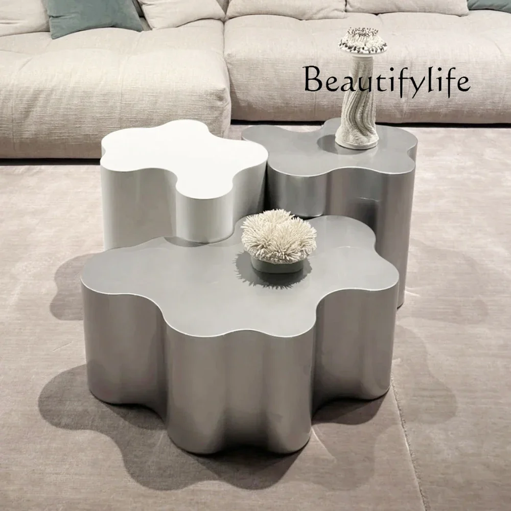 

Modern special-shaped stainless steel coffee table designer model room small apartment living room creative combination