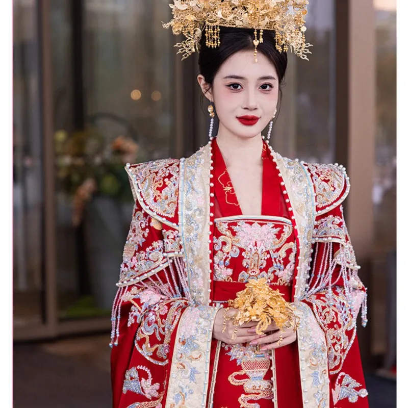 

A complete set of new wedding dress with phoenix crown and red veil featuring large Chinese-style drag