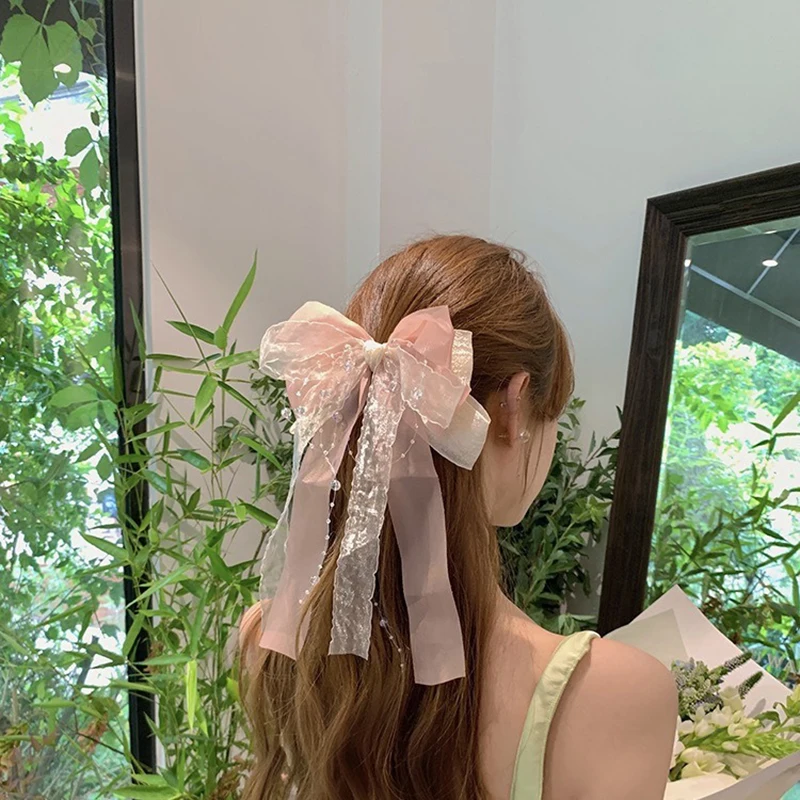 Bogen Frühling Clip Kristall verdrehte Perlen Streamer Frauen Mädchen rosa süße Haarnadel Haars pange Mode Mädchen Haarschmuck Kopf bedeckung