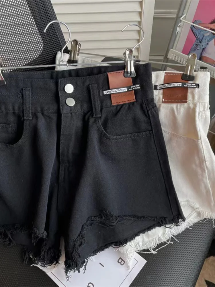 Pantaloncini di jeans a vita alta di grandi dimensioni da donna che dimagriscono pantaloni caldi a trapezio strappati a gamba larga alla moda
