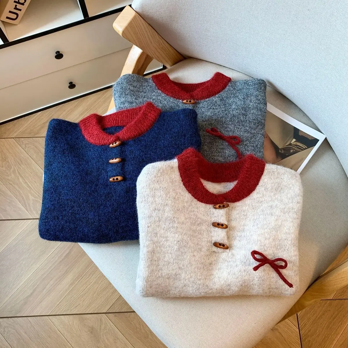 Pull en tricot avec boucle d'angle, couleur contrastée, nouvelle collection automne-hiver 2026, doux et cireux, nœud papillon, haut de gamme, mode femmes