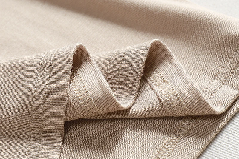 Hochwertige Elastische Basic Einfarbige Langarm-T-Shirts Schlichte Baumwoll-Damen-T-Shirts Lässige Oberteile Koreanischer Stil Dünnes O-Ausschnitt T-Shirt – Detail 12