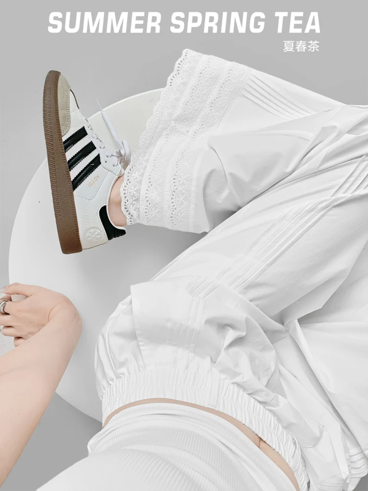 Pantaloni lunghi floreali dimagranti a vita alta casual da donna con patchwork di pizzo originale da tè primaverile estivo